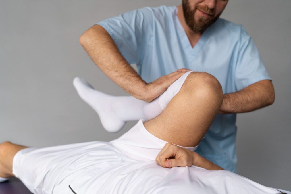 physiotherapist helping patient front view